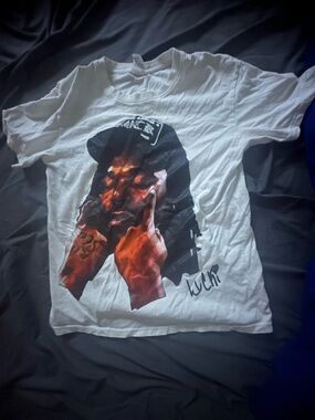 Graphic Image White T-Shirt with Bold Portrait and Orange Accents